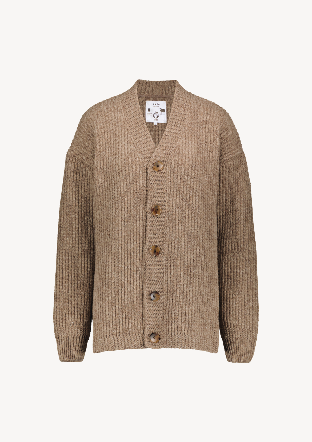 Ribbed longer beige cardigan with relaxed fit. Made of responsbile Finnish sheep wool in Finland. 