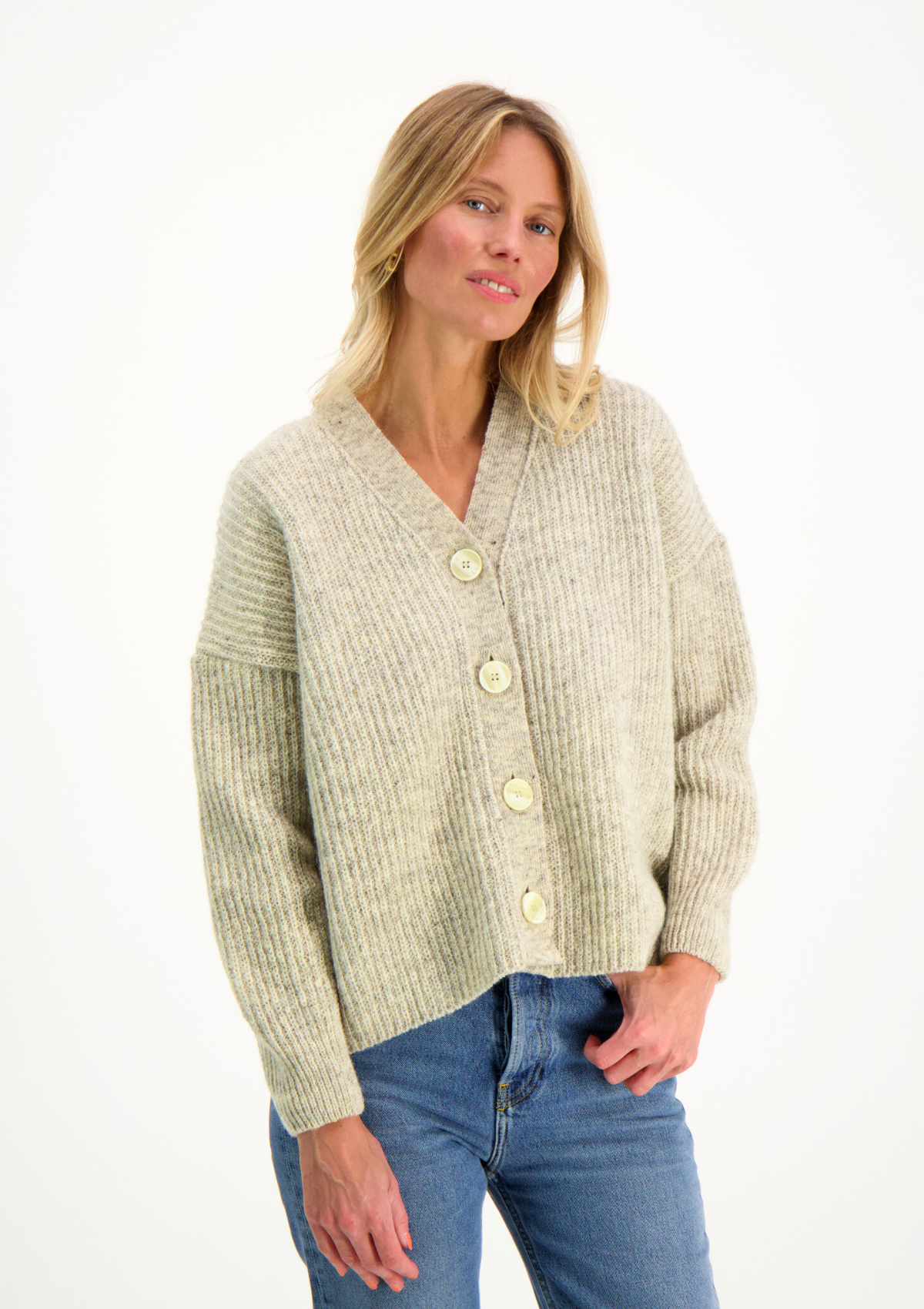 Light grey cardigan responsibly made in Finland from Finnish sheep wool. 