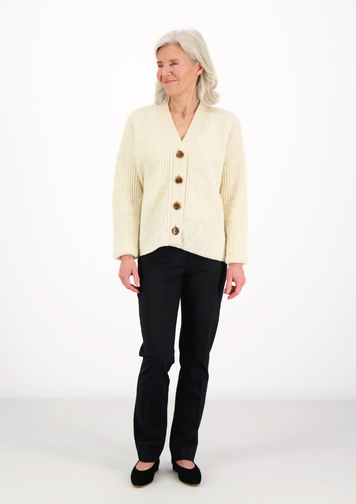 White ribbed cardigan made in Finland from Finnish sheep wool. Sustainable and ethical.  