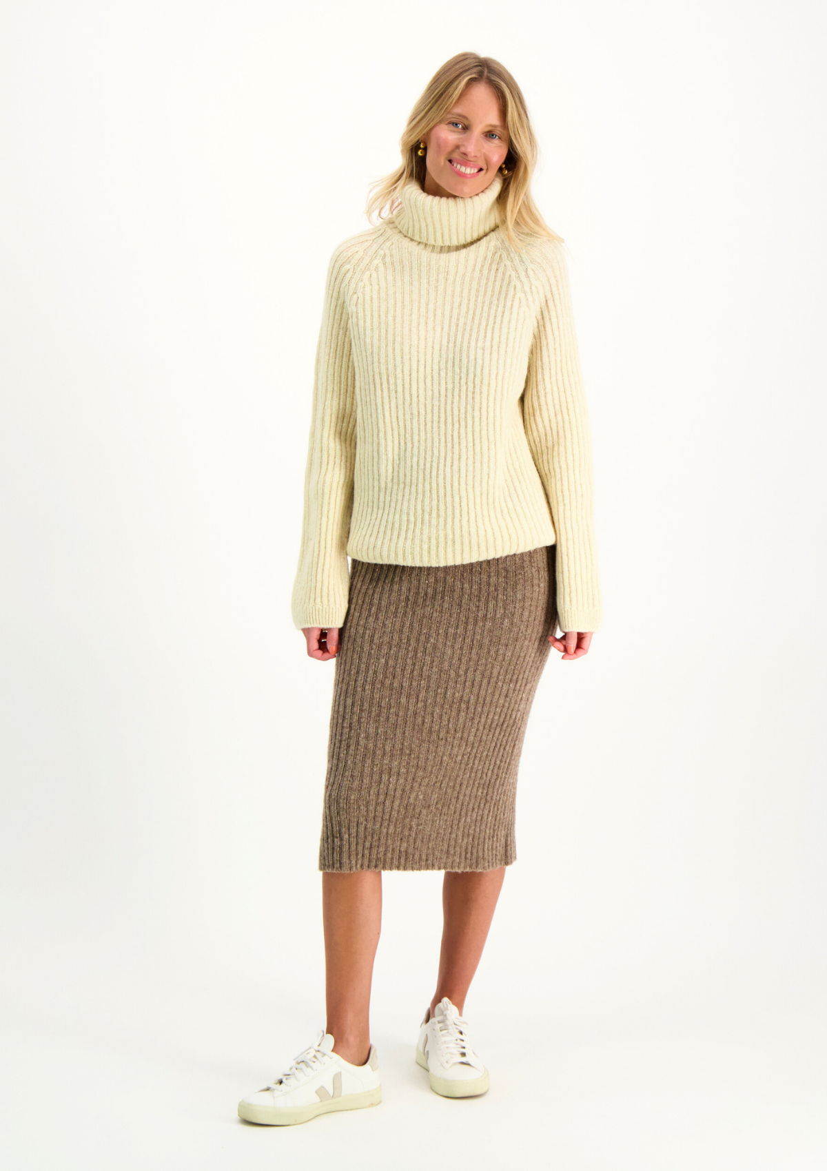 Beige ribbed midi skirt in Finnish responsible sheep wool. Made in Finland.  