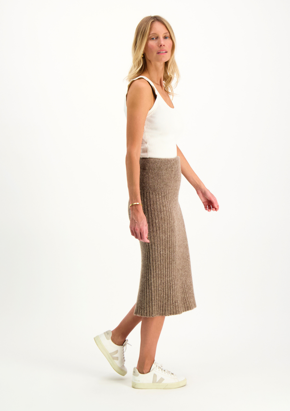 Beige ribbed midi skirt in Finnish responsible sheep wool. Made in Finland.  