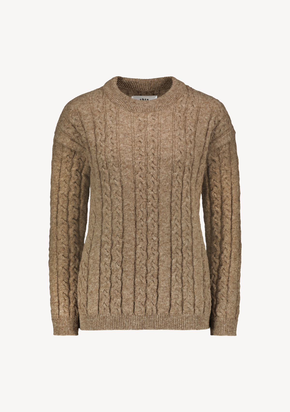 Soft and elegant cable knit in beige with o-neck. Made of responsible Finnish sheep wool in Finland. 