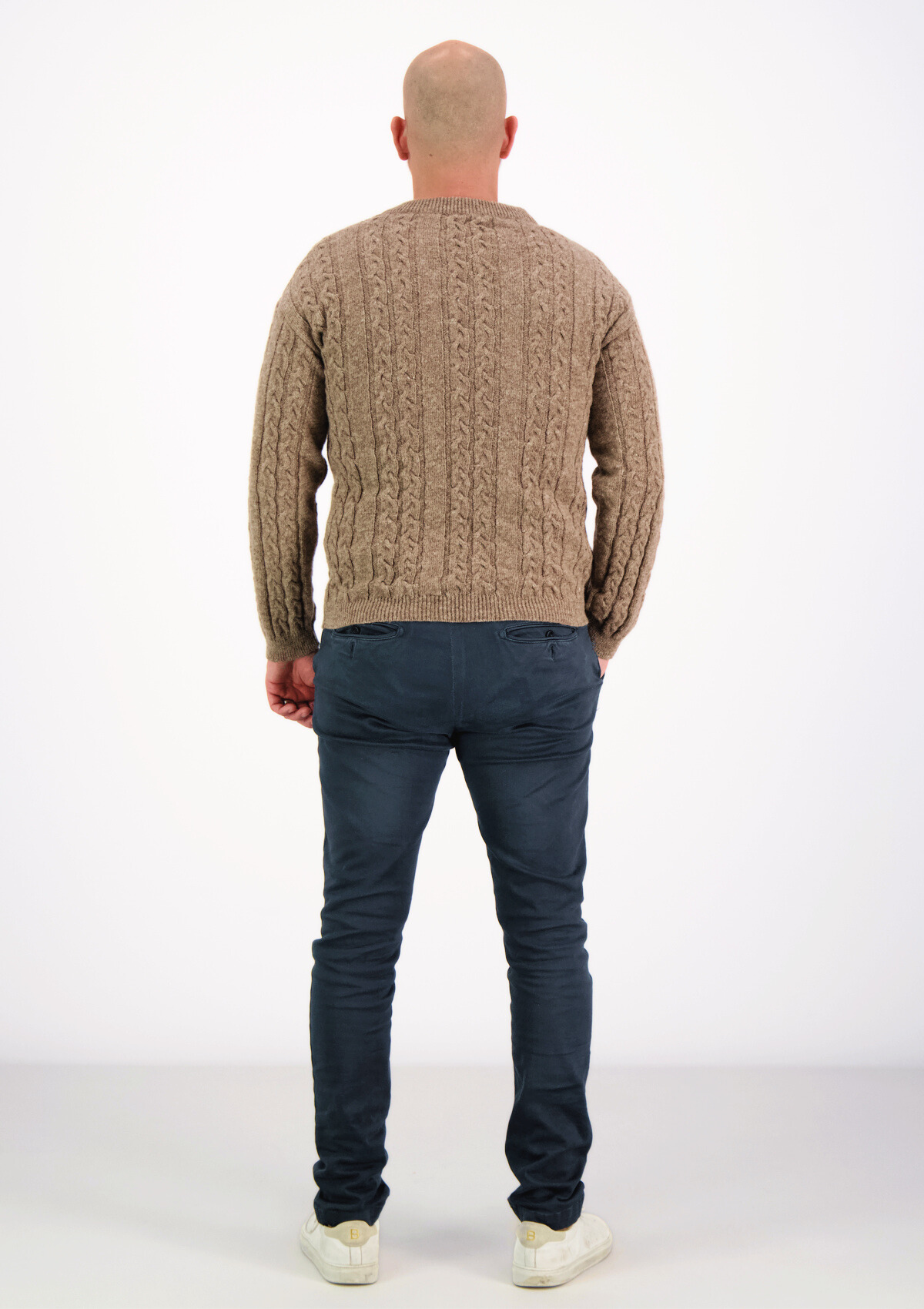 Soft and elegant cable knit in beige with o-neck. Made of responsible Finnish sheep wool in Finland. 